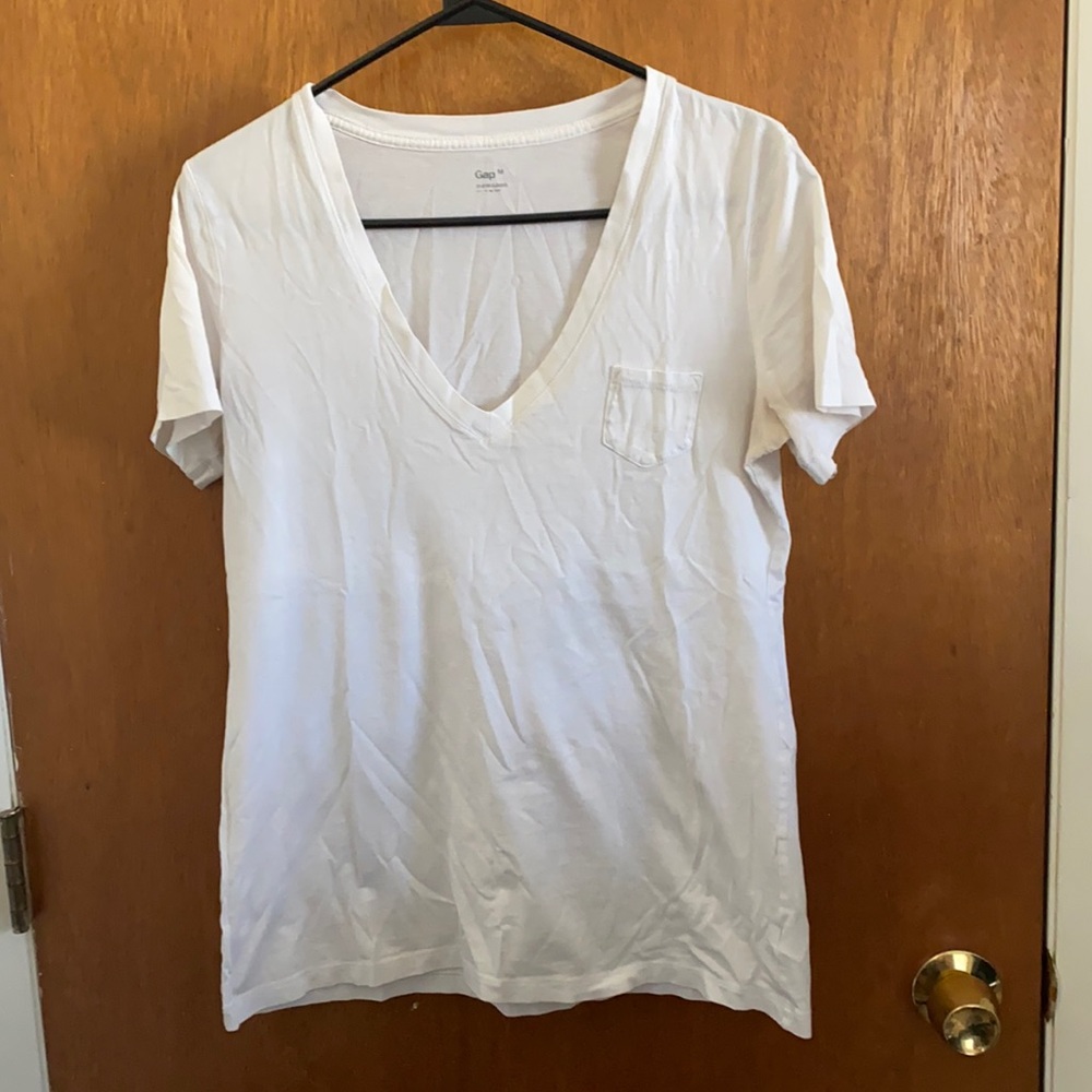 White V-neck top